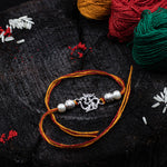 Load image into Gallery viewer, “Divine harmony” OM Silver Rakhi