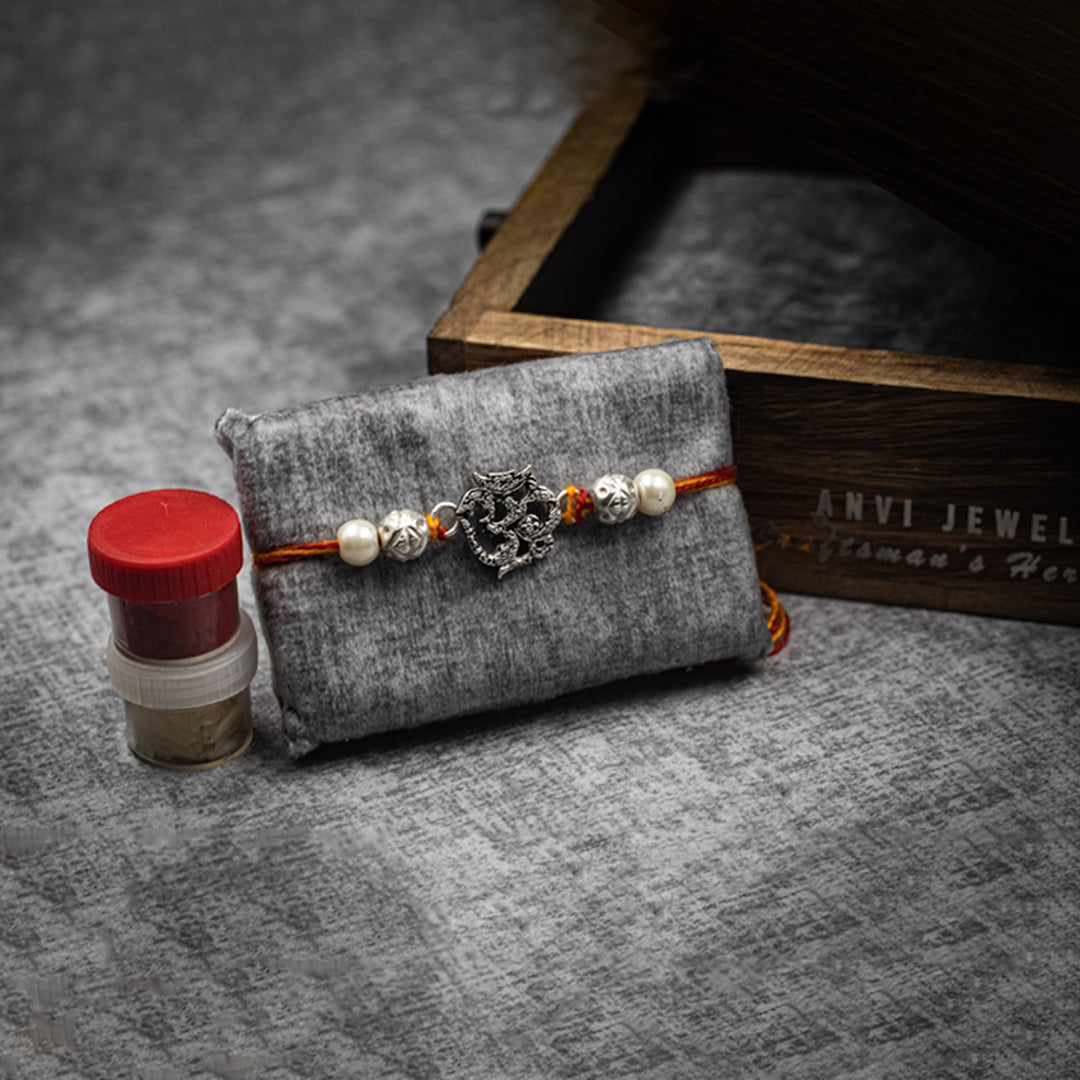 “Divine harmony” OM Silver Rakhi